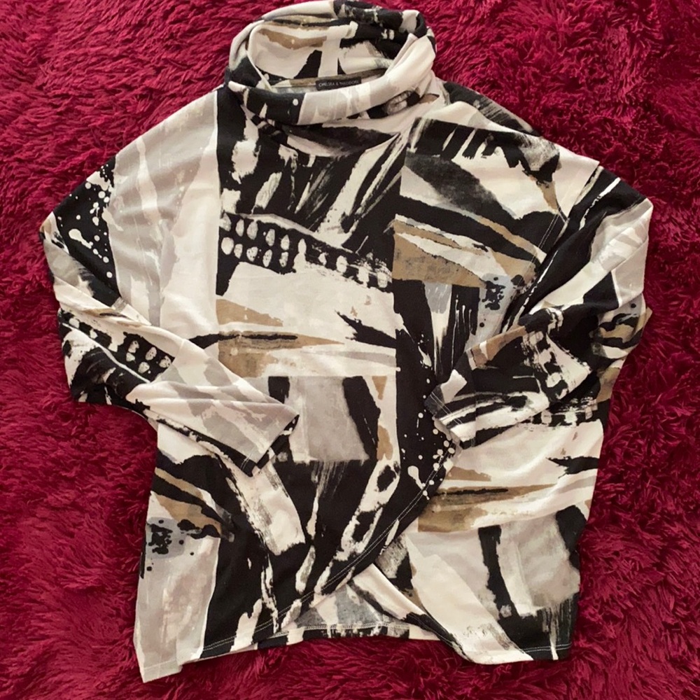Black, tan, and grey poncho